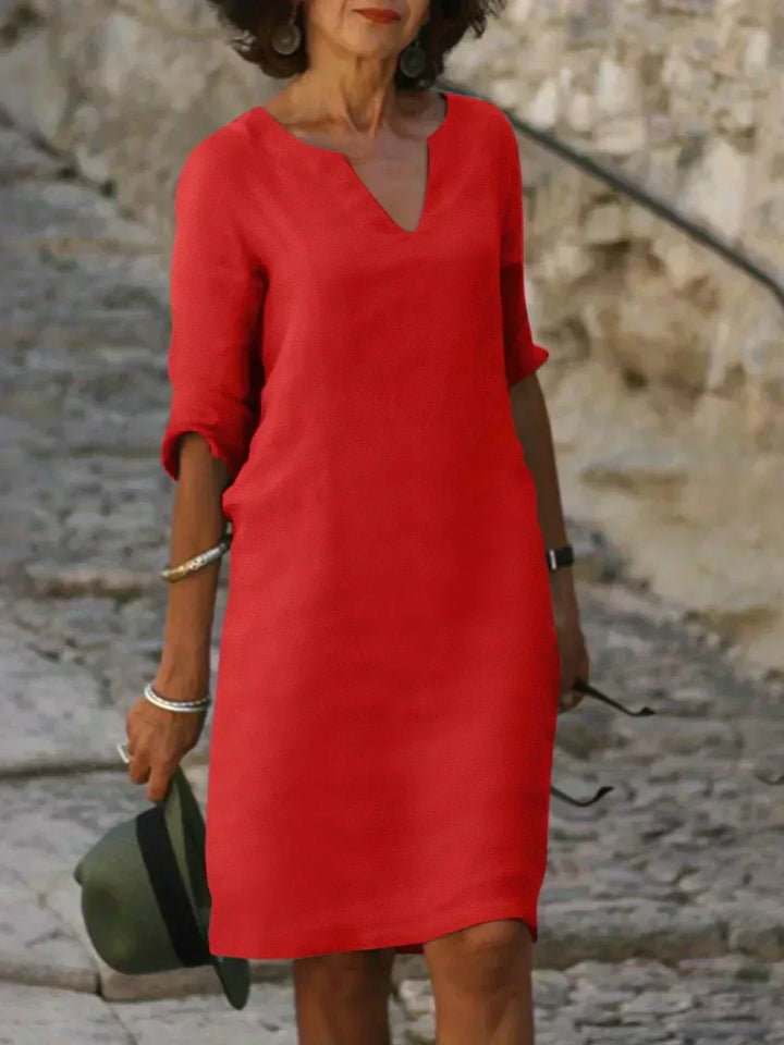Emery – Elegant and refined dress that covers the belly