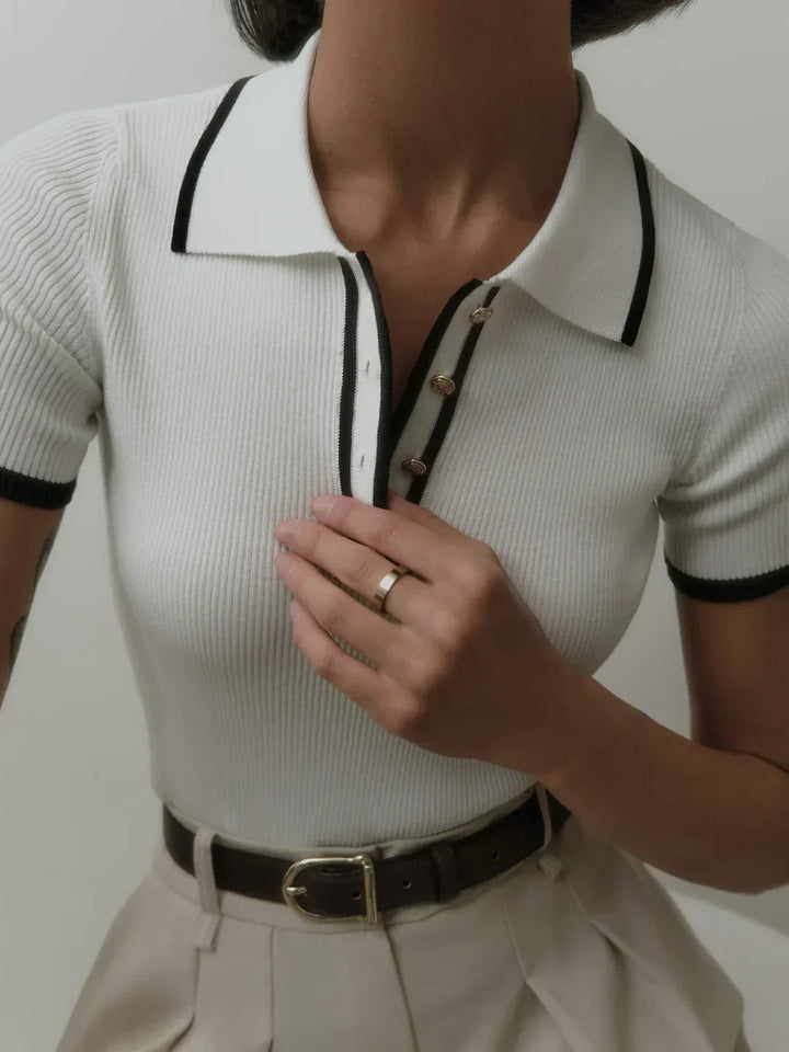 Knitted top with metallic buttons and contrasting details