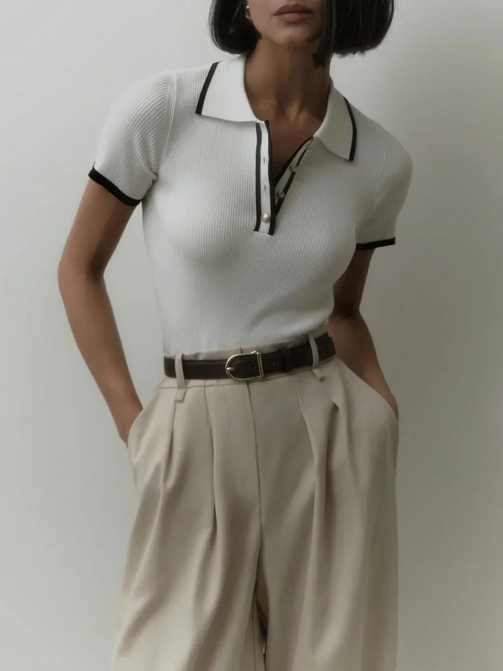 Knitted top with metallic buttons and contrasting details