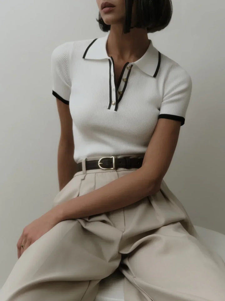 Knitted top with metallic buttons and contrasting details