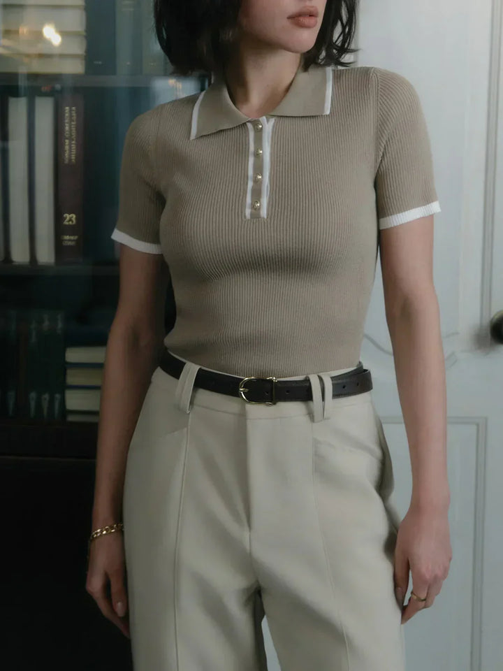 Knitted top with metallic buttons and contrasting details